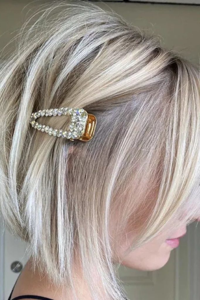 Volume and poise—this woman’s curly hair, earrings, and off-shoulder top create a confident and serene aesthetic with warm studio lighting.
#voluminouscurls #naturalbeauty #curlyhairstyle #warmportrait #confidentlook