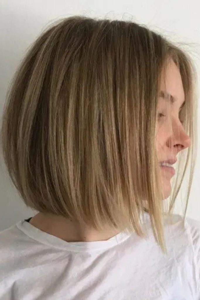 Turn heads with this sleek silver-blonde bob—smooth layers and a chic finish make it the perfect modern hairstyle for any season. Ideal for those looking for a short haircut with a bold twist, this bob adds a touch of elegance to any look. A stunning option for silver hair inspiration or straight bob hairstyle ideas.
#BobHaircut #SilverBlondeHair #ModernHairstyle #ShortHairInspo #ChicBob
