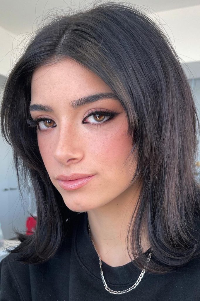 This long dark hairstyle paired with subtle makeup and a silver chain captures a calm, reflective mood with minimalist style. A great pin for anyone drawn to natural beauty, understated elegance, or simple hair ideas.
#LongDarkHair #NaturalLook #MinimalistStyle #CalmVibes #HairInspo
