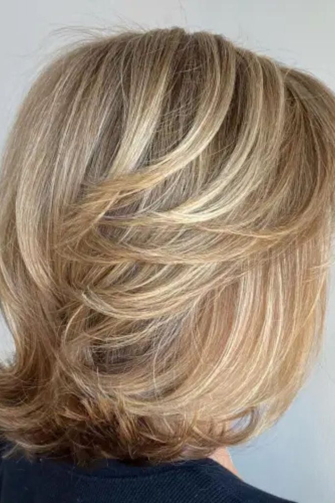 Confident and stylish, this short silver-blonde hairstyle shines with personality. The soft layers and profile view highlight movement and dimension—perfect for bold, modern hair goals. Save it if you love a sleek, standout cut!
#SilverBlondeHair #ShortLayeredStyle #ModernLook #BoldHaircut #ConfidenceInStyle