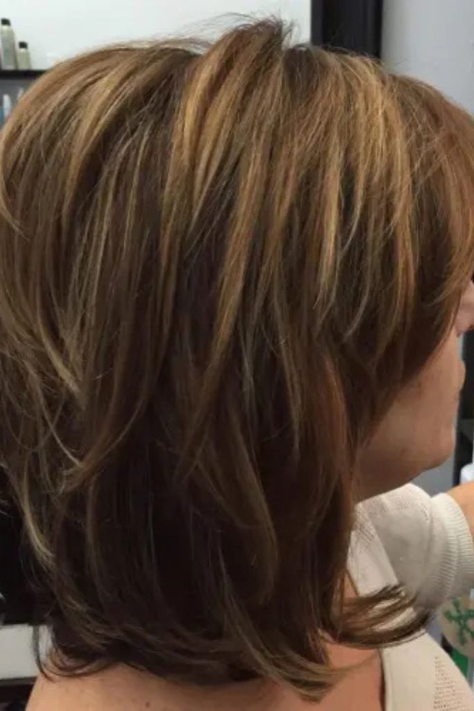 A blend of warm blonde, copper, and brown highlights gives this short layered haircut a beautifully textured, voluminous look. Smooth and modern, this cut is perfect for those wanting depth and dimension. Pin this for short hair color ideas and layered styles!
#LayeredHairstyle #BlondeHighlights #TexturedHaircut #ShortHairInspo #HairColorIdeas