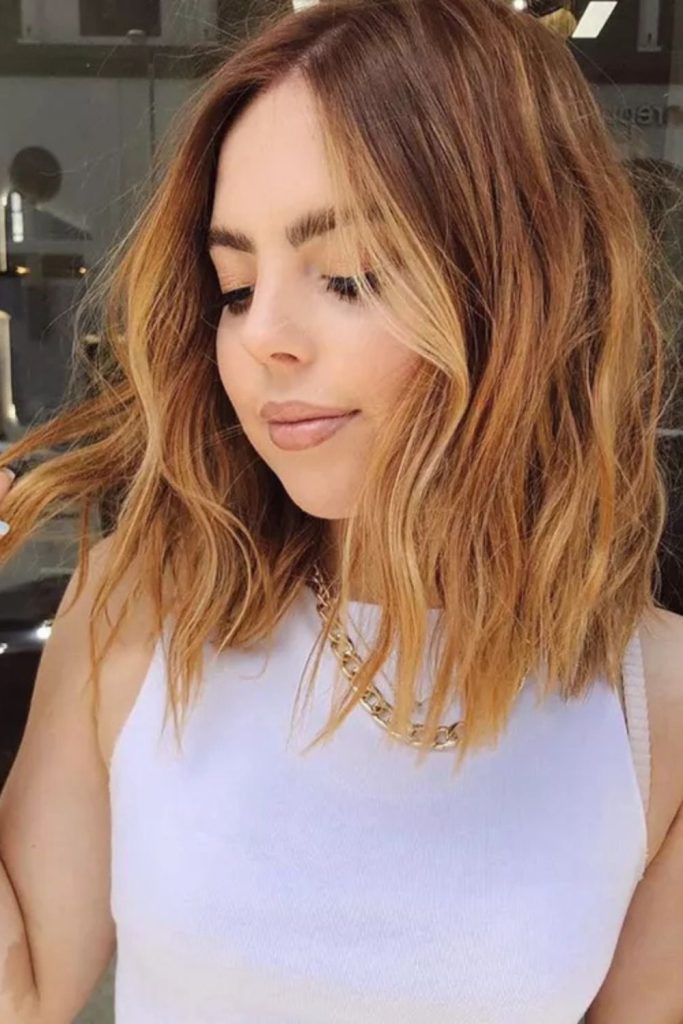 Tousled and trendy—this short brown hairstyle with round sunglasses and a black top offers effortlessly cool style against a clean white backdrop.
#shortbrownhair #roundsunglasses #casualcool #minimalistlook #effortlessstyle