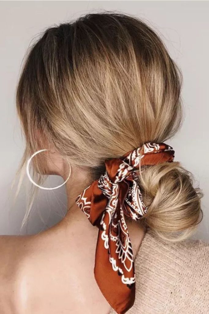 Messy bun lovers, this one’s for you—dark wavy hair swept up into a chic, effortless bun with gold hoop earrings and a soft smile to match. This relaxed off-shoulder look is great for simple updos and everyday elegance.
#MessyBunStyle #DarkHairInspo #EverydayUpdo #CasualChicLook #WavyHairVibes