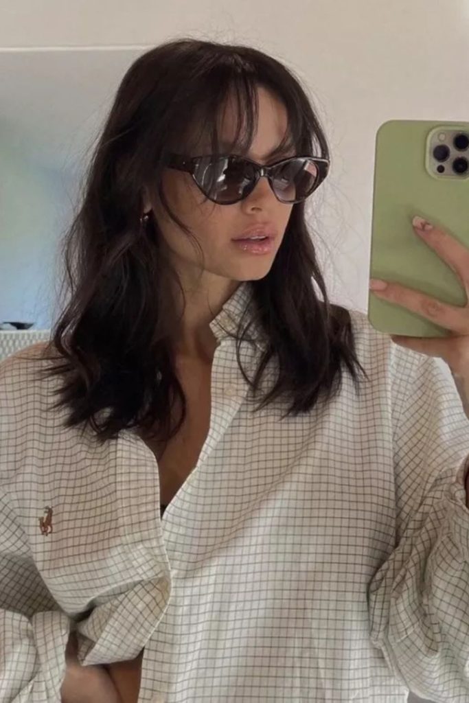 Curly hair meets cozy charm—this softly smiling person in a black patterned top brings relaxed, inviting energy to any scene. Great for curly hairstyle boards.
#curlyhair #naturalcurls #casualstyle #warmvibes #hairinspiration
