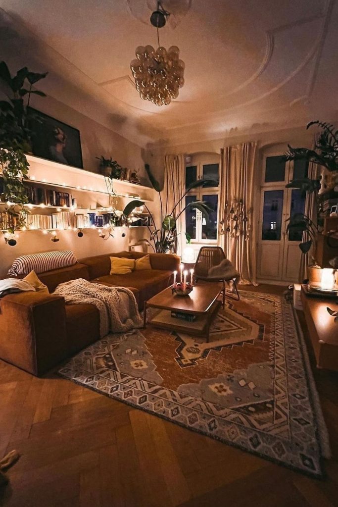 Warm lighting, patterned rugs, and indoor plants set the tone in this cozy brown sofa living room. It’s a perfect space for curling up with a book or hosting friends.
#BrownSofa #CozyLighting #PatternedRug #HomeComforts #WarmLivingRoom